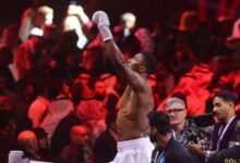 Anthony Joshua celebrating his win against Otto Wallin