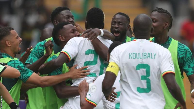 Senegal 3 – 0 Gambia (RESULT) 1 Holders Senegal defeated 10-man underdogs The Gambia to start their 2023 Africa Cup of Nations campaign. Holders Senegal defeated 10-man underdogs The Gambia to start their 2023 Africa Cup of Nations campaign. header 36